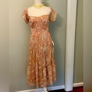 Stunning off the shoulder peach colored lined ruffled dress!